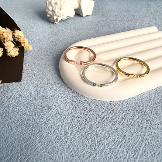 Custom Open Two Initial Ring displayed in silver, yellow gold, and rose gold options.