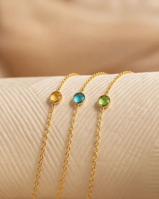 Eraya Jewel dainty birthstone bracelets featuring different birth month stones in 22K gold finish