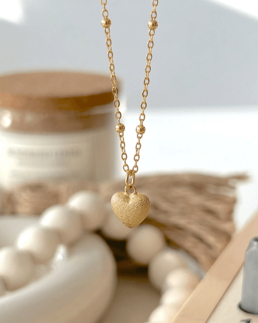 textured 10mm heart pendant necklace with fine chain and bead accents