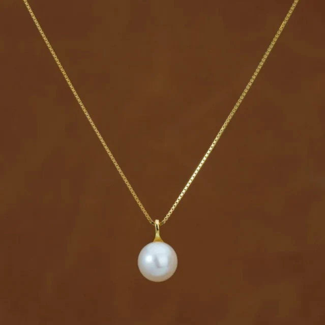 Close-up of the Minimalist Pearl Pendant featuring a single genuine pearl on a sleek 925 sterling silver chain
