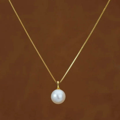 Close-up of the Minimalist Pearl Pendant featuring a single genuine pearl on a sleek 925 sterling silver chain