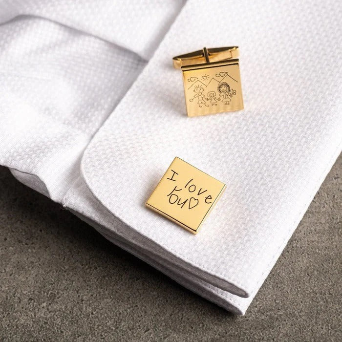 Close-up of Eraya Jewel Golden Engraved Handwriting Cufflinks being worn on a shirt cuff, showcasing a deeply personal and unique accessory