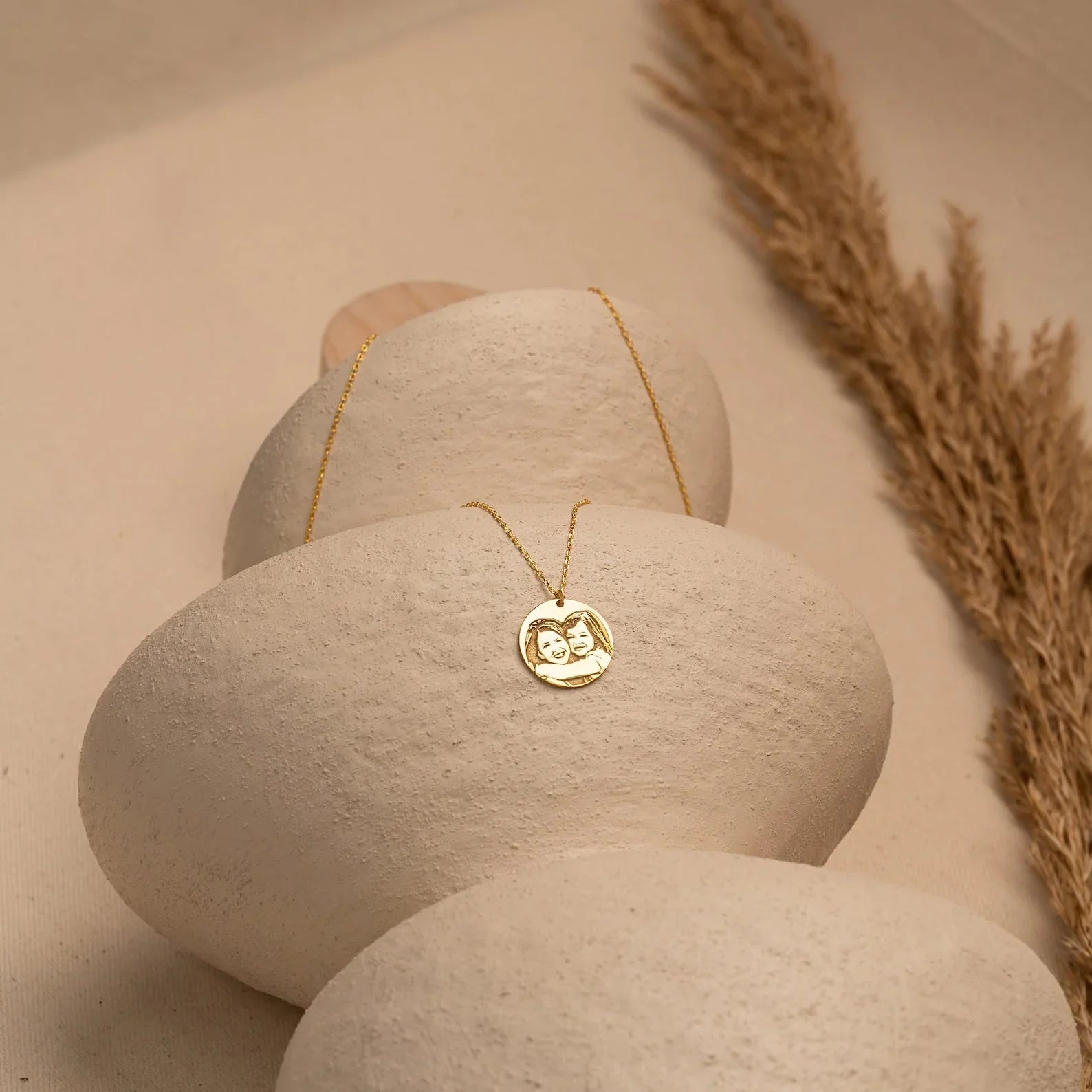 Eraya Jewel Personalized Photo Memorial Pendant resting gently on a surface, perhaps with a meaningful item in the background, evoking remembrance and sentiment