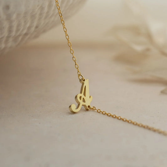 Eraya Jewel 'Carrie Font' Initial Bracelet in a luxurious Gold finish – Product shot highlighting the custom script initial
