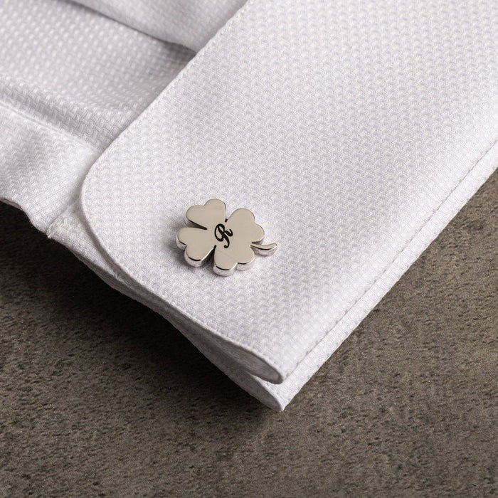 Man wearing Eraya Jewel Silver Engraved Four-Leaf Clover Name Cufflinks, showcasing a personalized lucky charm on his shirt cuff