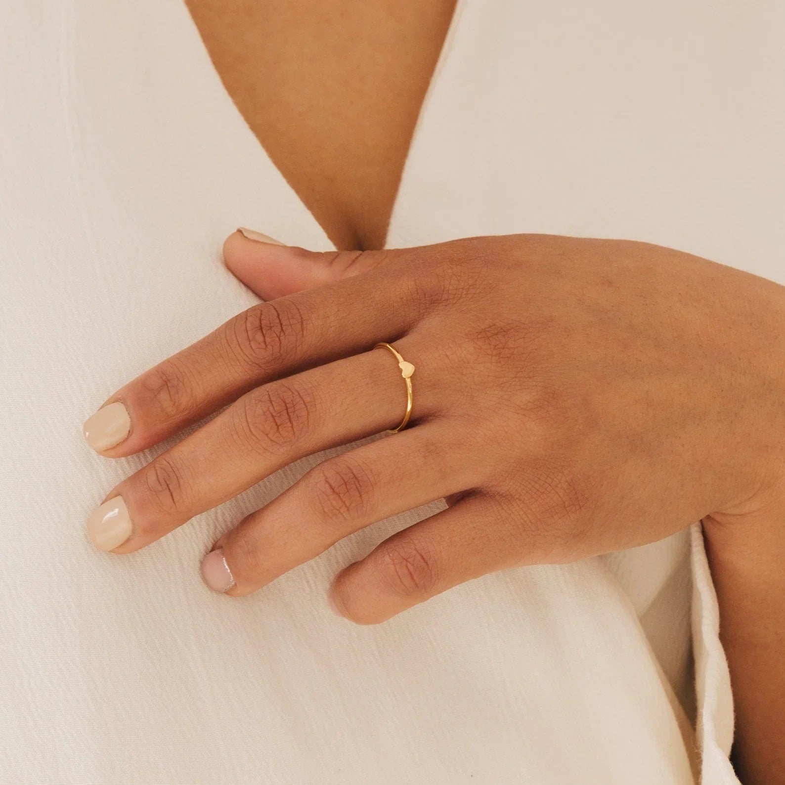  Dainty Minimalist Tiny Heart Ring worn, showcasing delicate jewellery style.