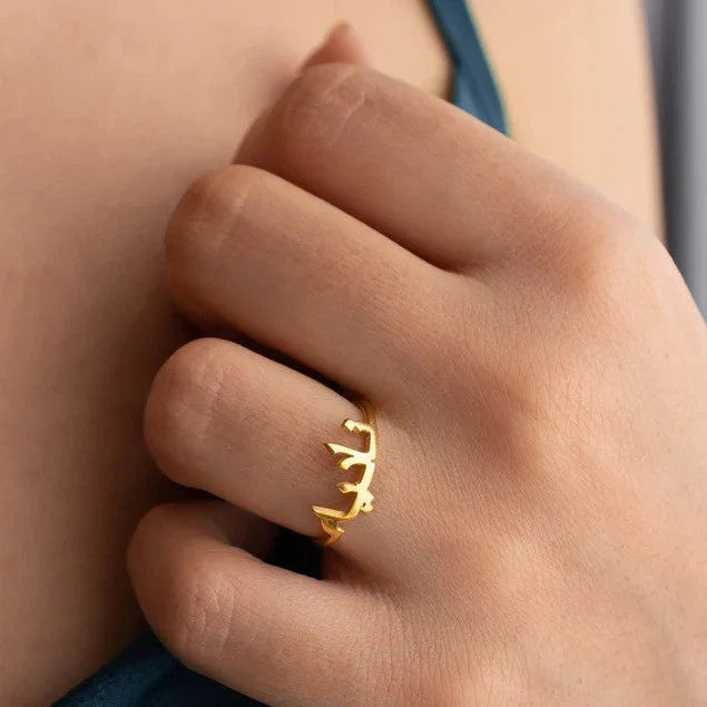 Custom Arabic Name Ring for Her crafted in polished yellow gold finish.