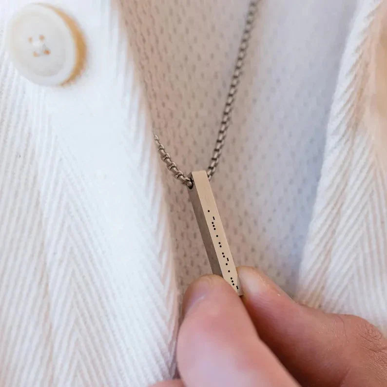 Detailed view of the Custom Men's Morse Code Bar Pendant in a silver-polished finish, highlighting its minimalist design and custom engraving.