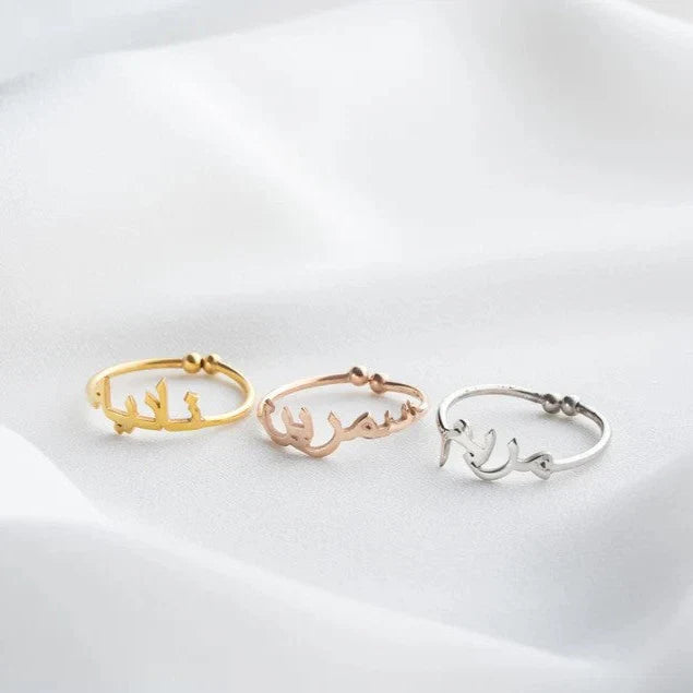 Custom Arabic Name Ring for Her shown in yellow gold, silver, and rose gold options.