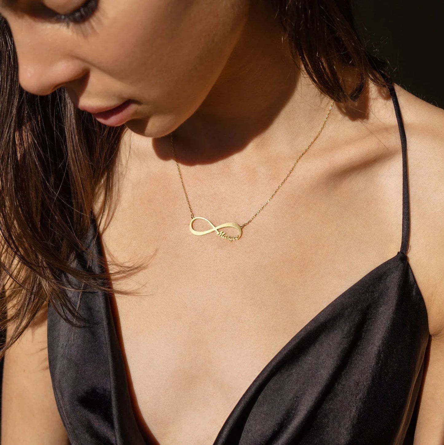 Model wearing the Personalized Name Infinity Necklace