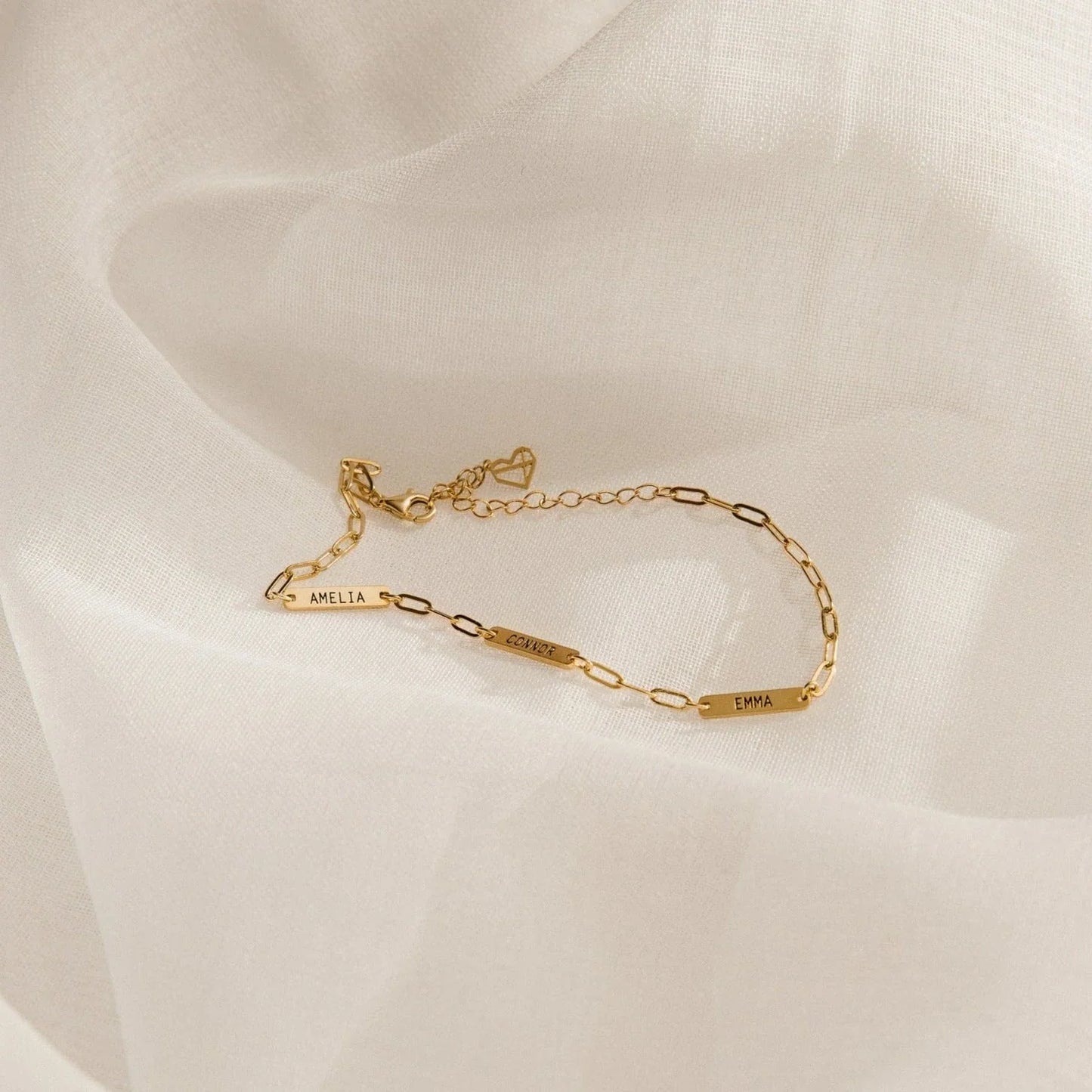 Detailed view of an Eraya Jewel Golden Engraved Mini Name Bar Bracelet, focusing on the crisp personalized engraving on the mini bar.