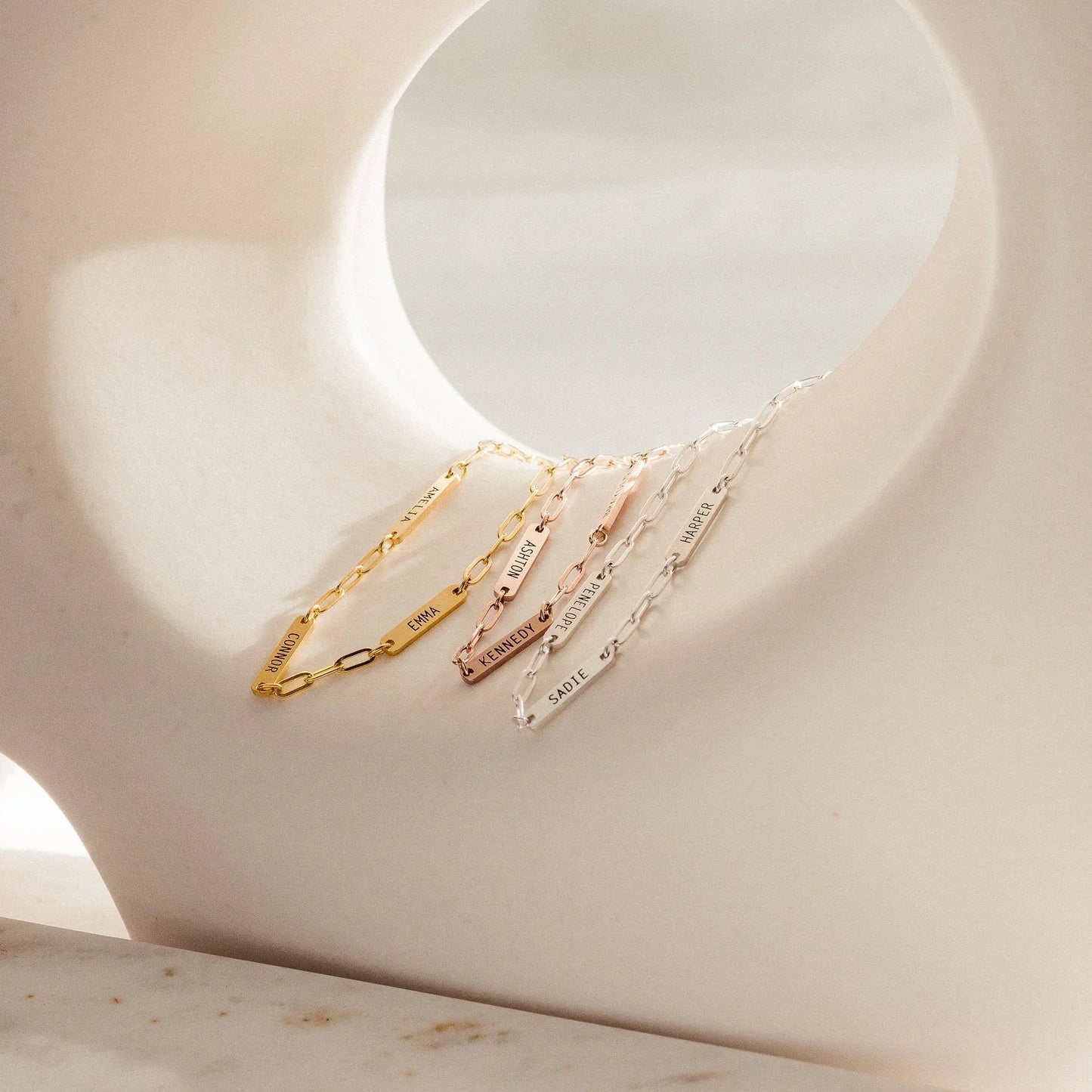 Eraya Jewel Engraved Mini Name Bar Bracelets available in Gold, Silver, and Rose Gold finishes – Product image showing personalized options