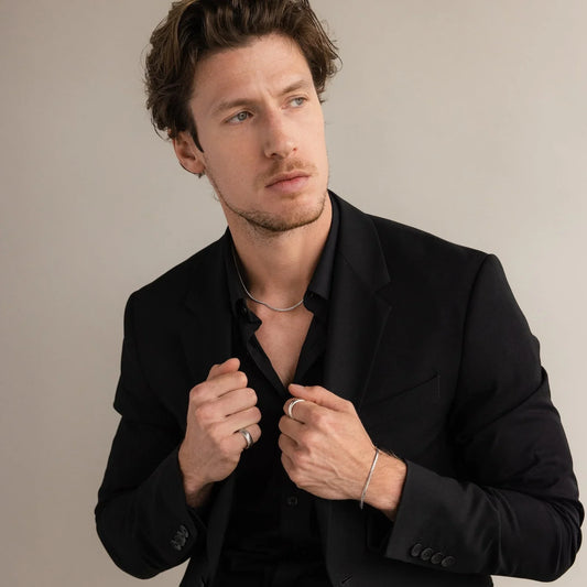 Model's hand showing a Thick Half Round Fingerprint Ring, highlighting personalized keepsake jewelry style.