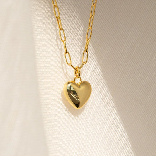 Close-up of the Paperclip Heart Pendant showing a sleek paperclip chain with a delicate heart charm.