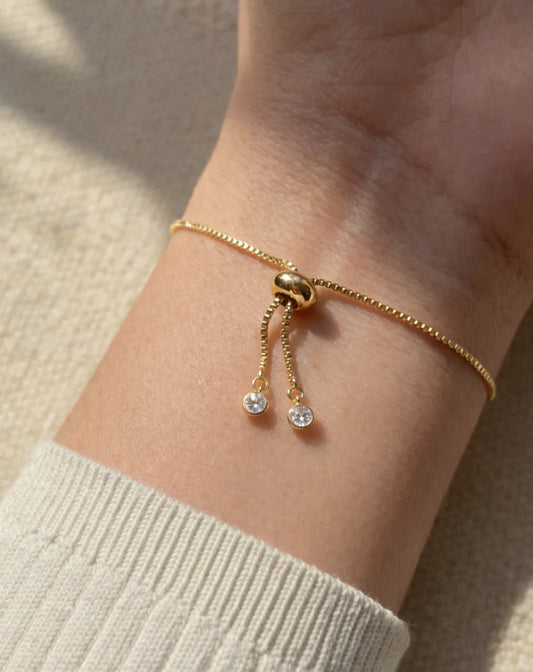adjustable sliding closure bracelet with gold chain detail