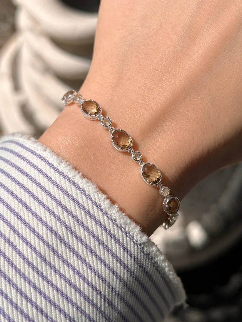 Anti-tarnish Golden Hour Gemstone Bracelet for women with adjustable fit and champagne crystal gemstones.