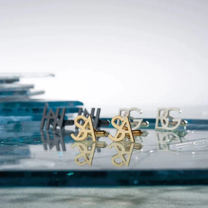 Eraya Jewel 'My Initials' Cufflinks displayed in three available finishes: Gold, Silver, and Gray.