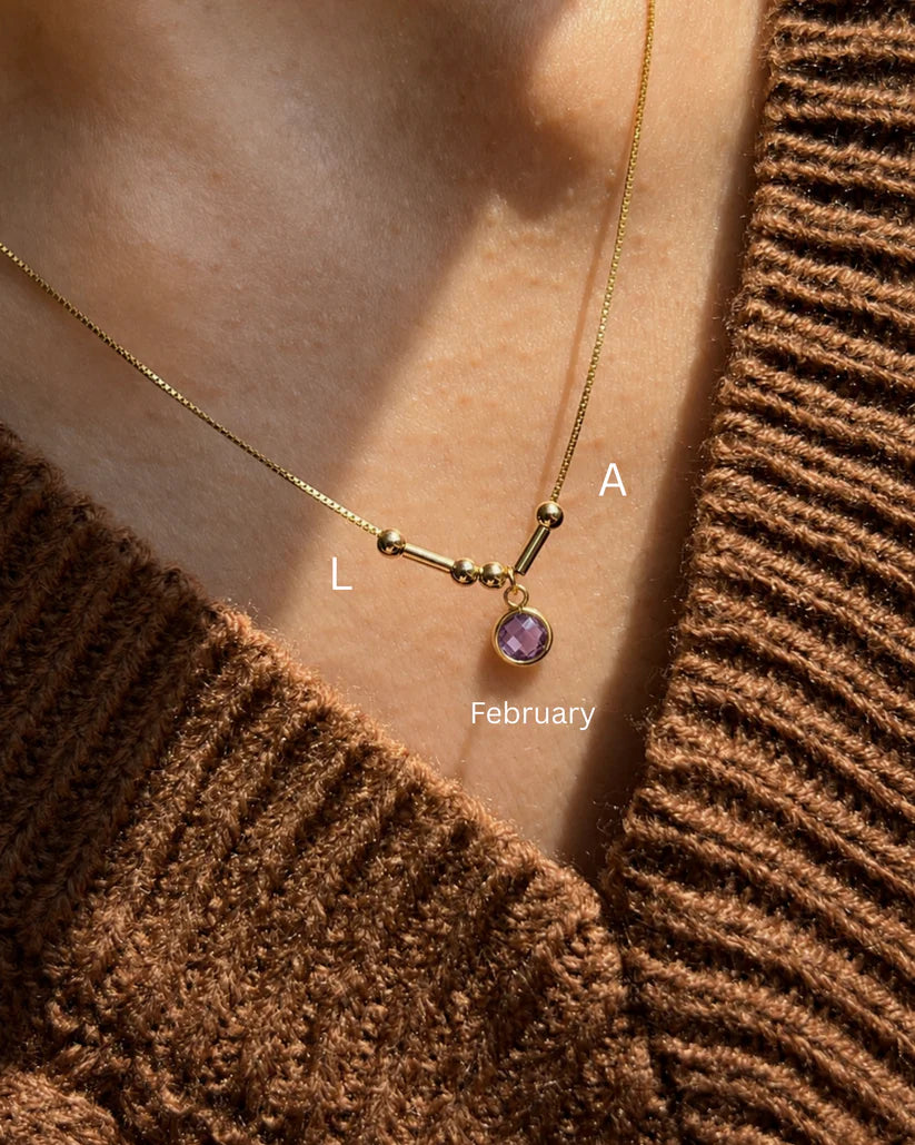 Custom Birthstone Morse Code Initials Necklace personalized with initials and a February birthstone, handcrafted in premium 22K gold finish by Eraya Jewel.