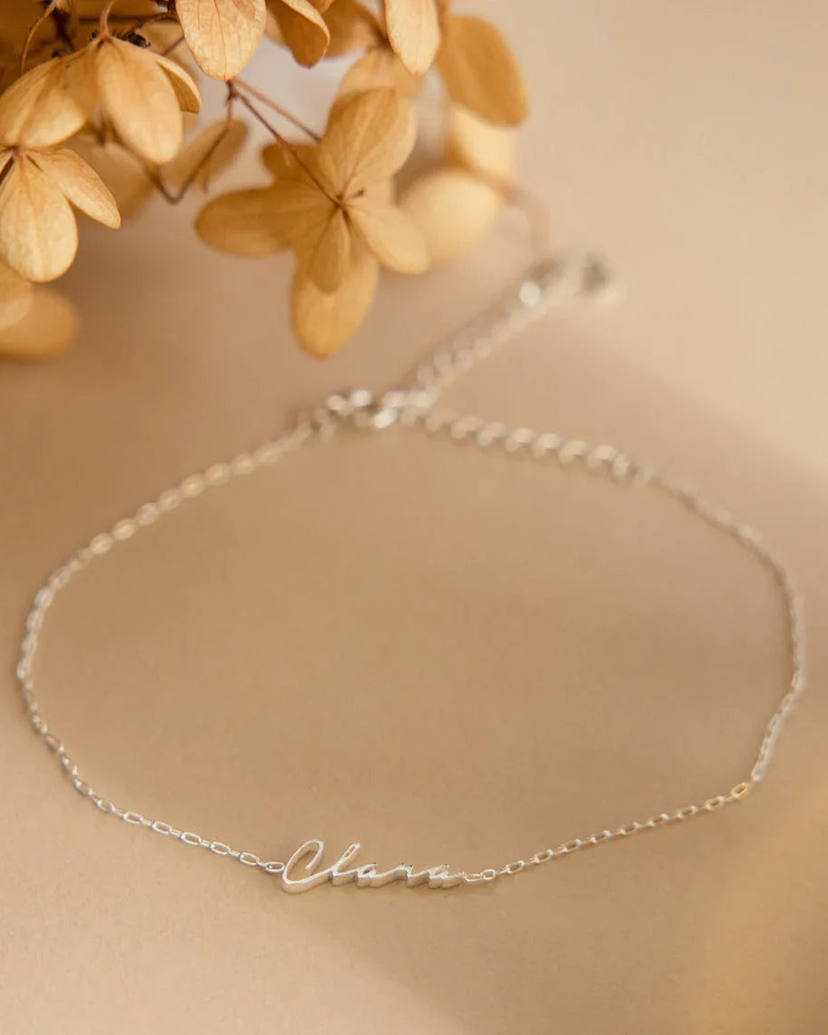Product image of the Eraya Jewel Dainty Name Bracelet in polished Silver, featuring its fine chain and custom name option.