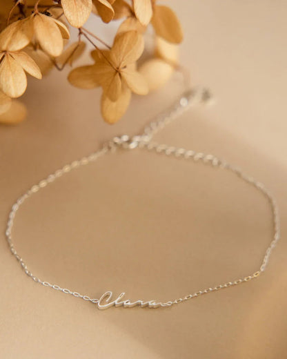 Product image of the Eraya Jewel Dainty Name Bracelet in polished Silver, featuring its fine chain and custom name option.