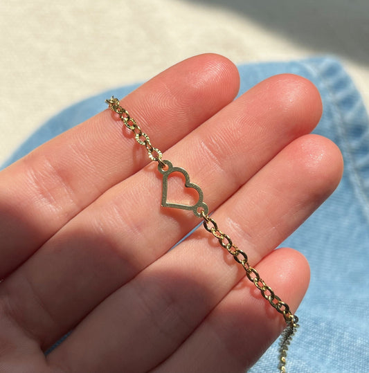 Elegant heart-shaped anklet gift idea for women, photographed in soft natural light.

