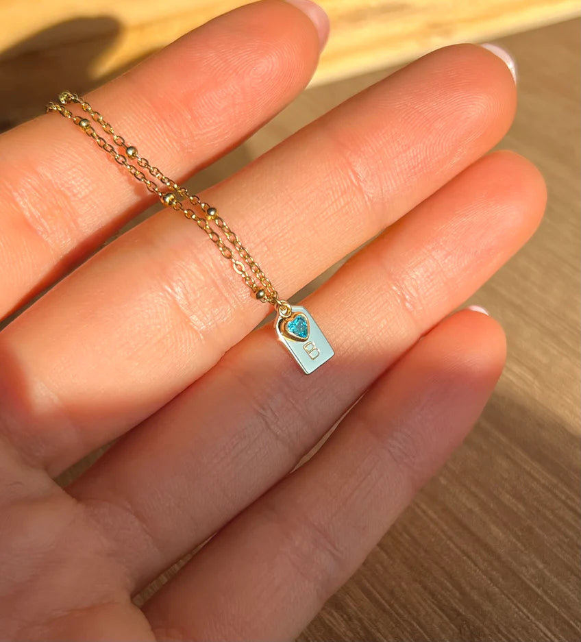 Personalized anti tarnish initial necklace in gold micron finish with birthstone detail