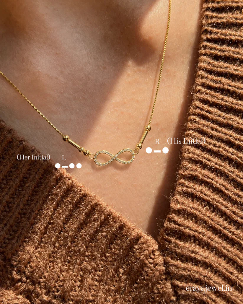Eraya Infinity Initial Morse Code Necklace with personalized initials and infinity symbol, meaningful couple necklace in gold and rhodium finish.