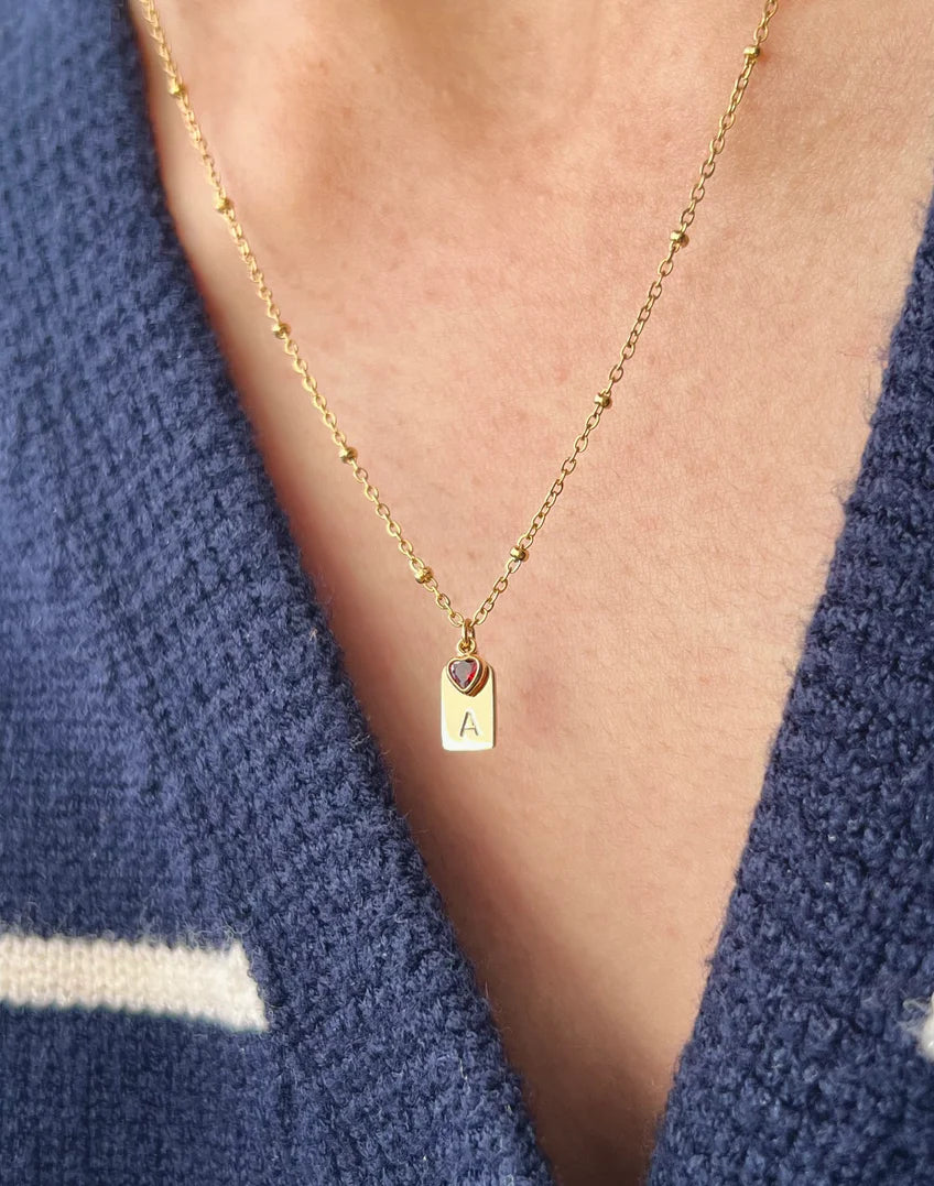 Gold initial pendant necklace with heart birthstone charm by Eraya Jewel
