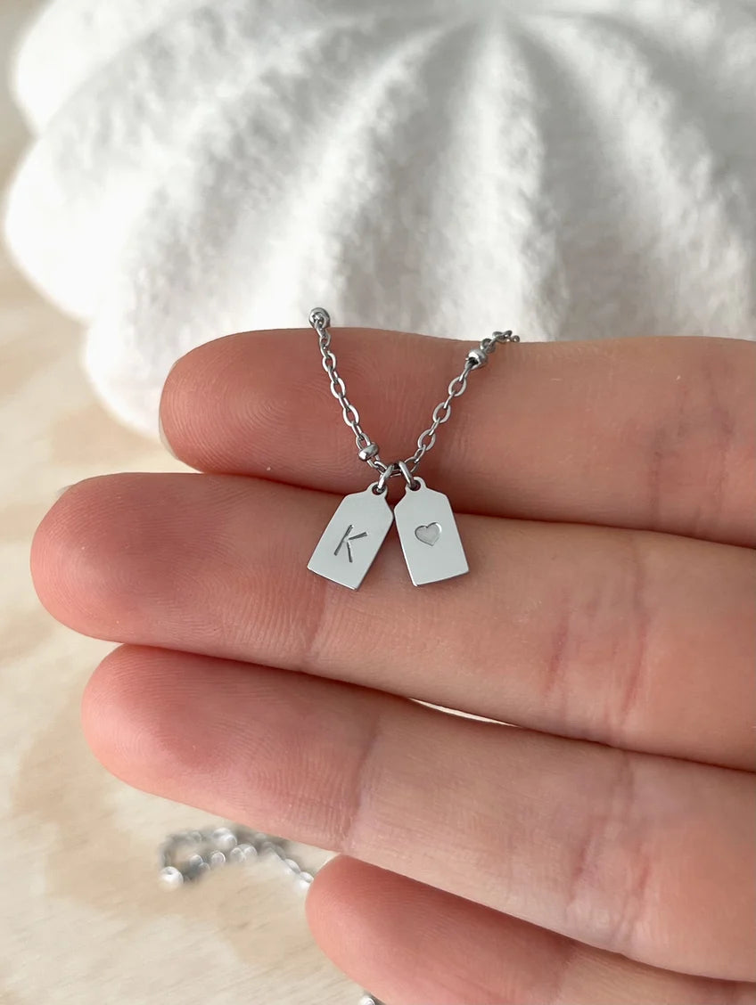 Eraya Jewel custom couple necklace with two personalized initials and one small heart charm