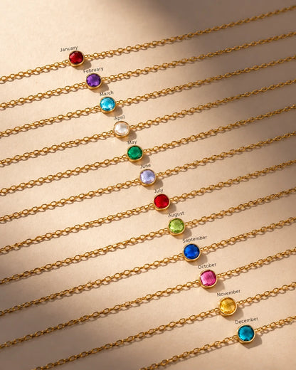 Eraya Jewel dainty birthstone bracelet collection in 22K gold finish showing birthstones for all twelve months