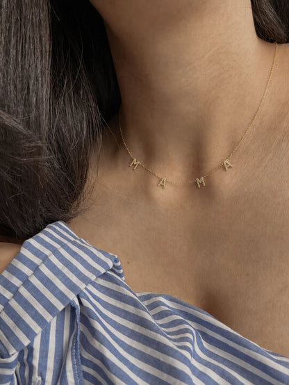 Minimal Pavé MAMA Necklace by Eraya in 22K gold finish, elegant everyday jewelry inspired by the trending celebrity MAMA necklace, perfect Mother's Day and newborn baby gift.