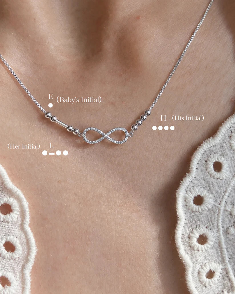 Personalized Morse Code Infinity Necklace by Eraya featuring custom initials connected with an infinity symbol for couples and families.