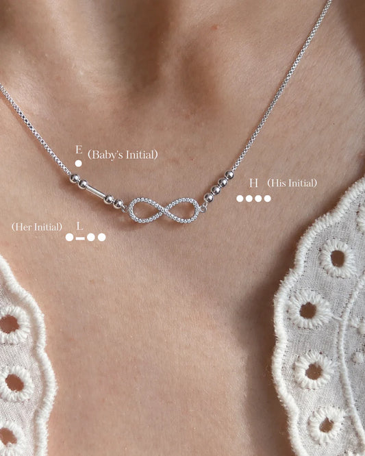 Personalized Morse Code Infinity Necklace by Eraya featuring custom initials connected with an infinity symbol for couples and families.