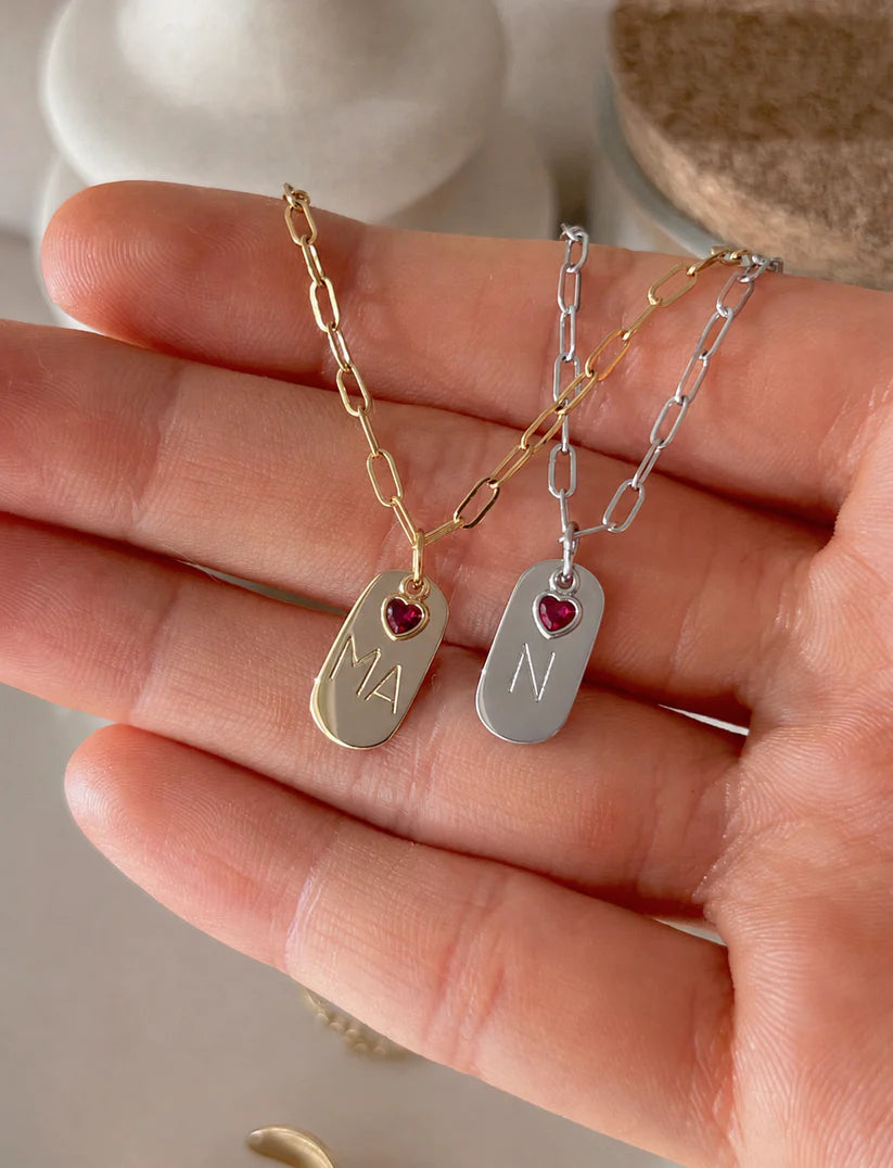 Personalized initial necklace with JL engraving and green heart charm in anti-tarnish gold finish by Eraya Jewel