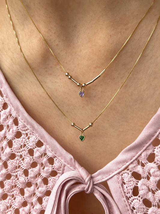 Layered Tiny Heart Morse Code Initials Necklaces in 22 karat gold finish featuring custom initials and colorful tiny heart stone charms