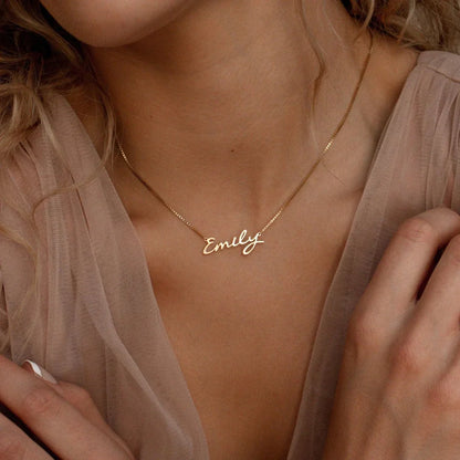 Model displaying the Personalized Callie Signature Necklace, a custom name necklace that blends modern and timeless style