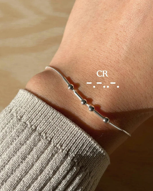 Eraya Jewel Elegant Custom Morse Code Bracelet in silver plated, highlighting the minimalist design and the encoded Morse code message.