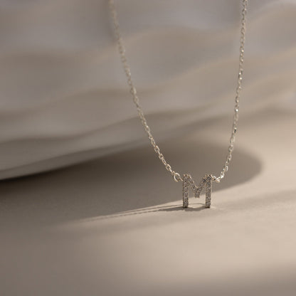Personalized Diamond Initial Necklace with 7mm pavé CZ letter M in Silver Finish on an anti-tarnish chain.