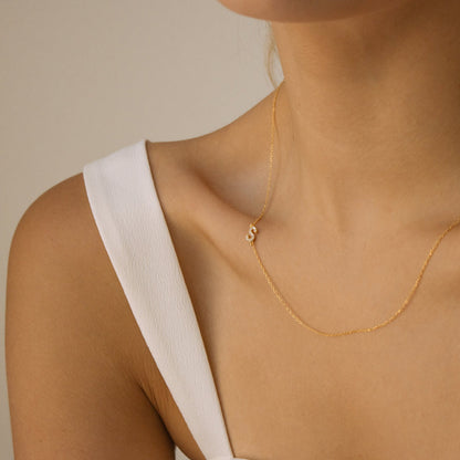 Personalized sideways pavé couple initial necklace with sparkling CZ initial S