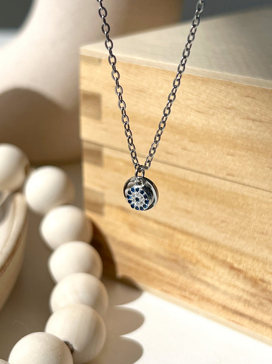 Secret initial pendant with evil eye