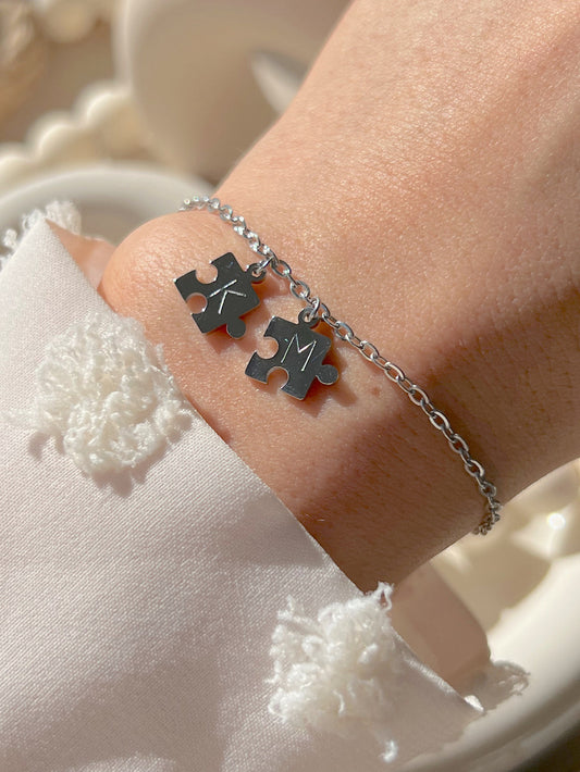 Model wearing silver you complete me bracelet 