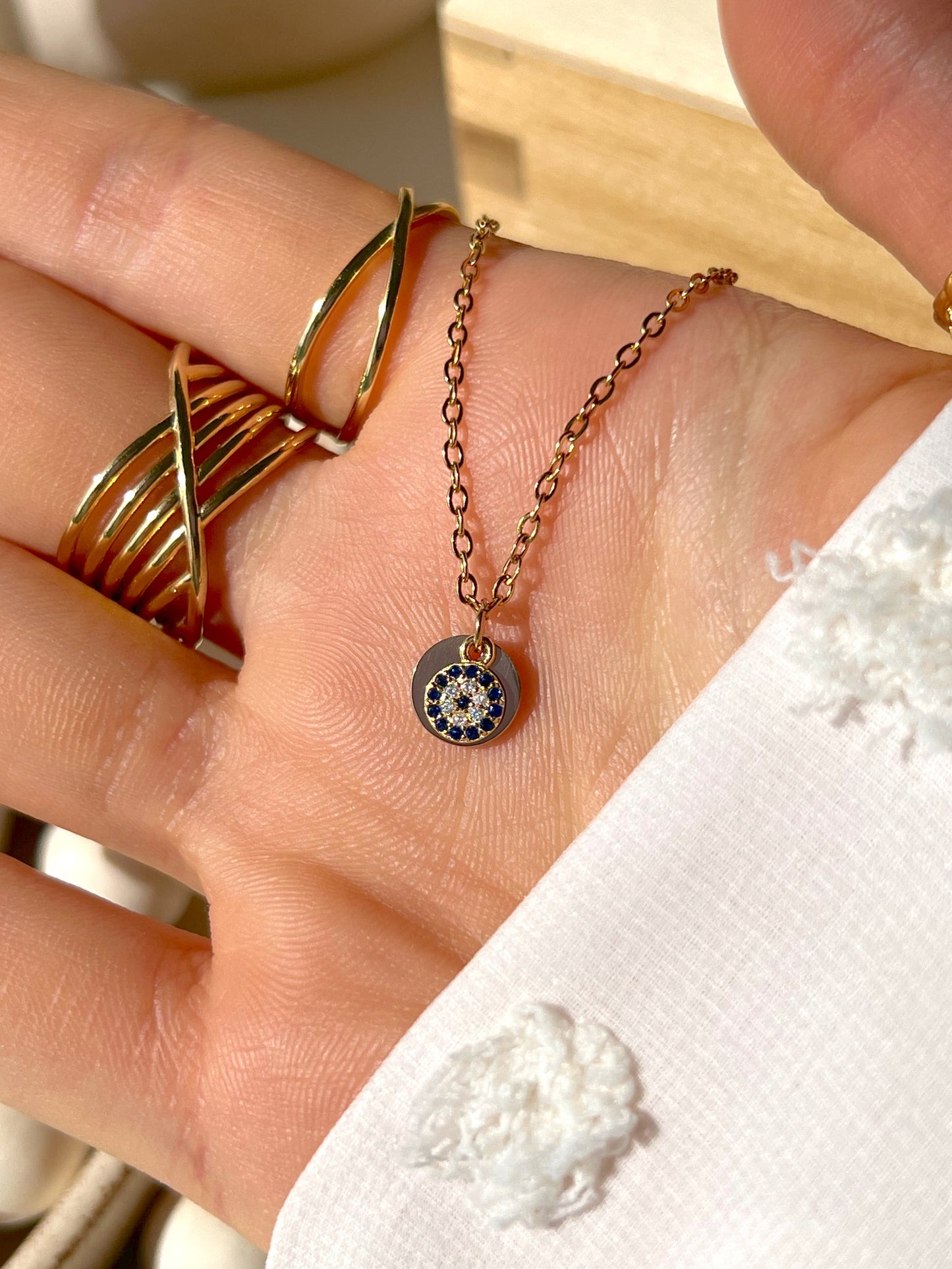 Secret initial pendant with evil eye