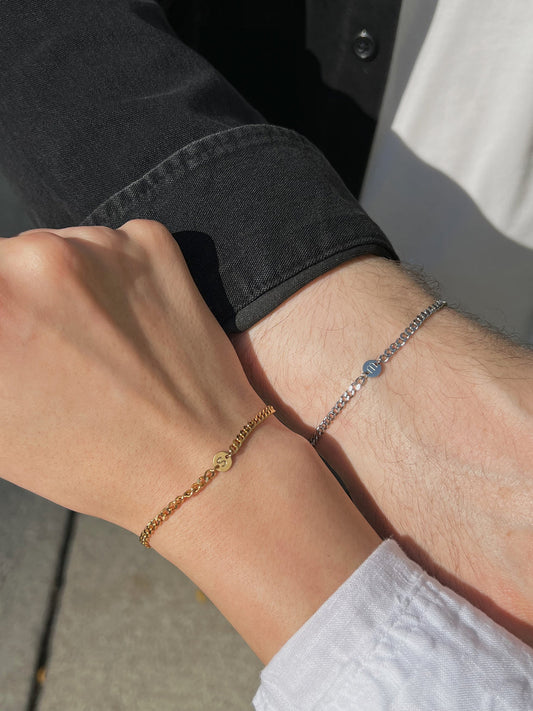 Couple wearing each other initial forever mine bracelet 