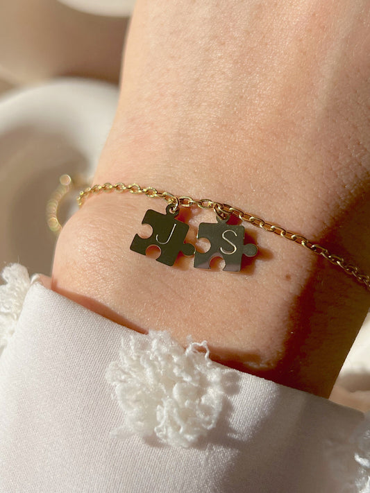 Model wearing you complete me gold bracelet 